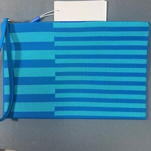 rothys the wristlet teal blue new with tags never used